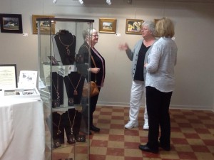 2 guests and artist talking