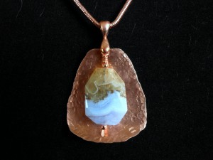 Hammered copper necklace with multifacet stone