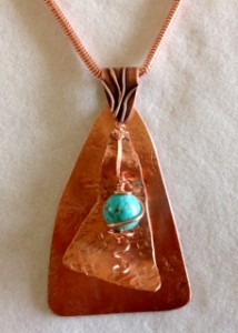 trianglar shape necklace in copper with turquoise howlite bead