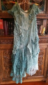 teal colored crocheted dress