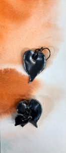 small leaf shaped earrings with black glaze
