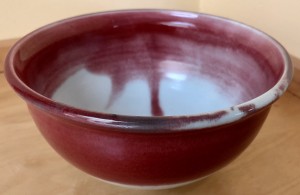 simple red bowl with white inside