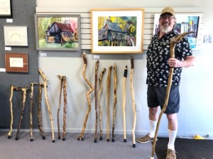 Artist holding a walking stick