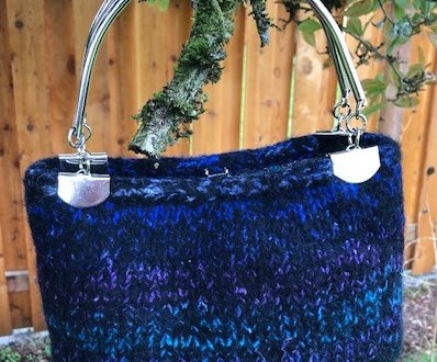 Felted purse with metal handle