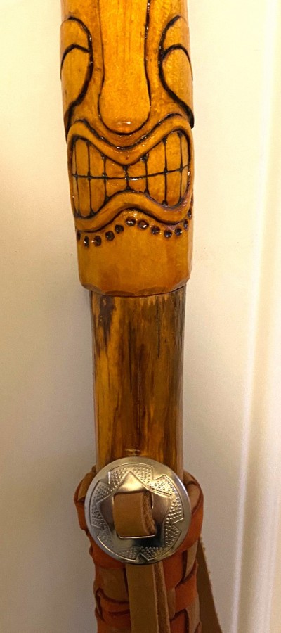 carved walking cane with gold ball