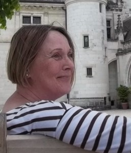 artist sitting by castle