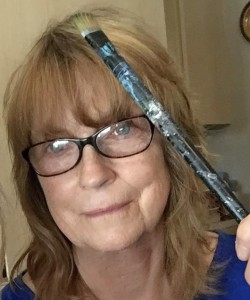 artist with paint brush