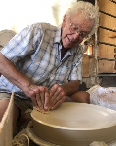 artist at potter's wheel