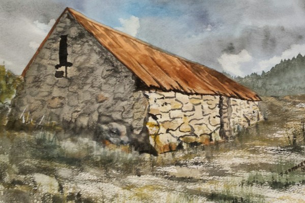 stone barn with orange roof