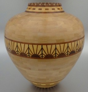 light colored tapered vessel with 2 patterns