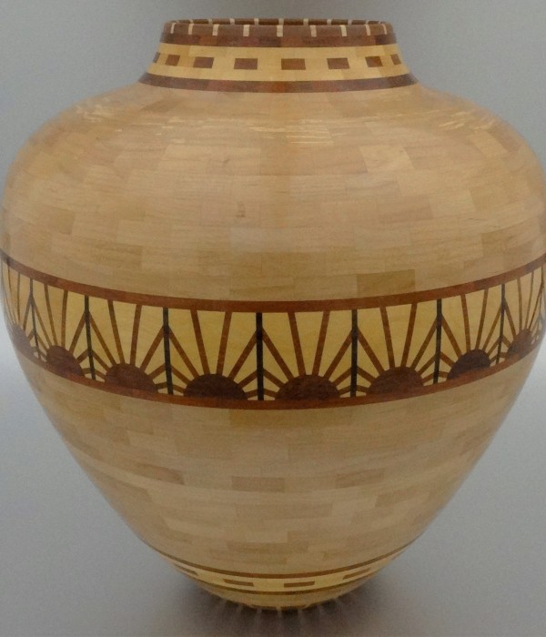 light colored tapered vessel with 2 patterns