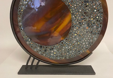smooth and texture glass circle mounted on metal