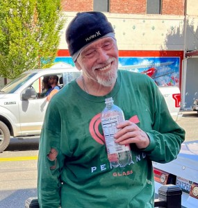 Artist outdoors in painting attire