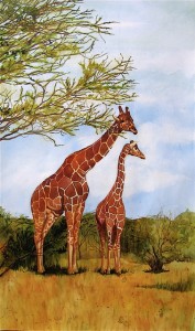 two giraffes standing near vegetation