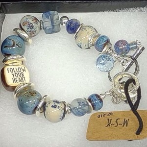 bracelet of various blue and clear stones