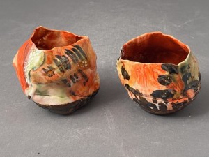 orange colored hand built cups