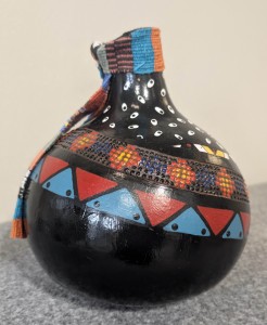 painted, beaded and carved gourd with Southwest design