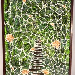 ceramic colored pieces to form a green path with some flowers