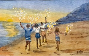 people carrying sparklers on the beach