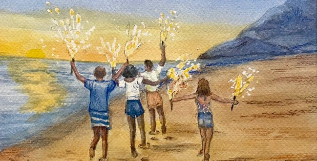 people carrying sparklers on the beach