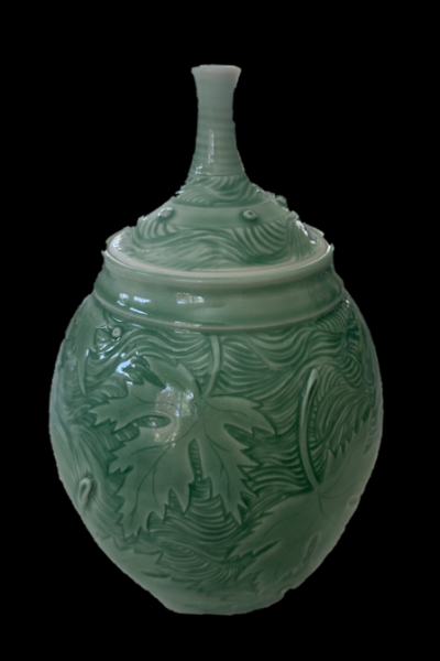 lidded vessel with maple leaf design