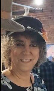 artist wearing a designed hat